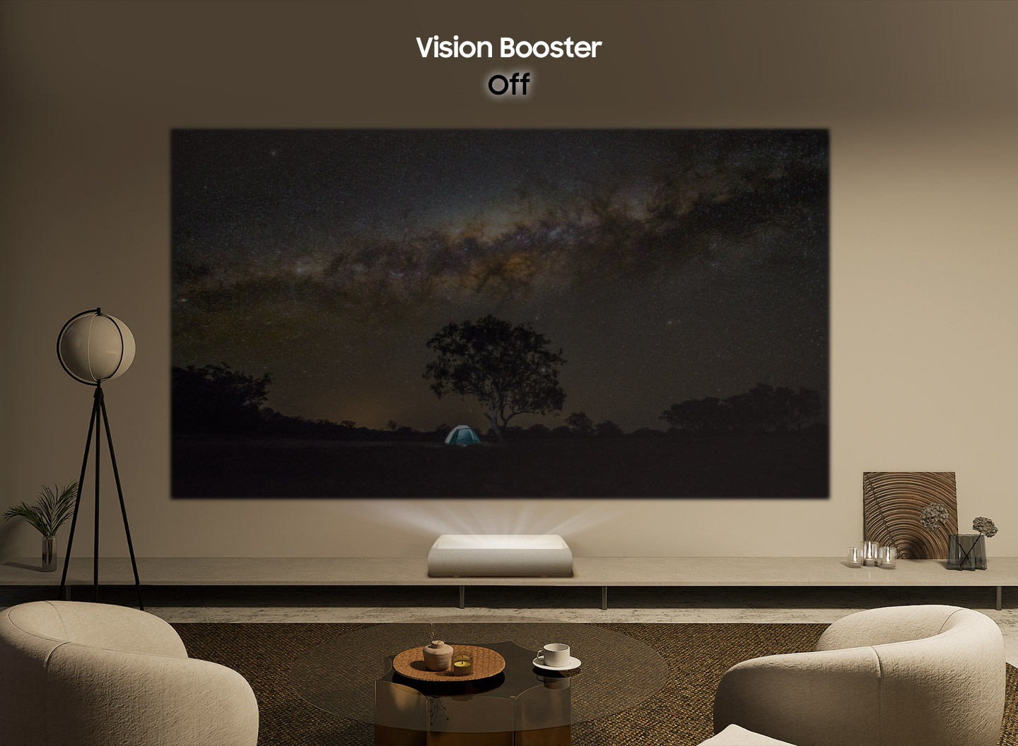The Premiere projects an image of a night sky onto the wall. Vision Booster is off. A nearby lamp turns on and floods the screen with light, so the image looks faint. With Vision Booster turned on, the image adapts to the lamp’s bright light and becomes clear.
