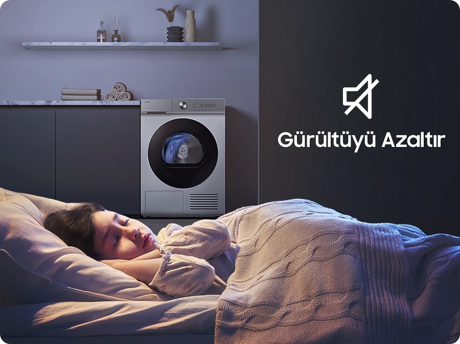 The child sleeps while the dryer runs silently at night.