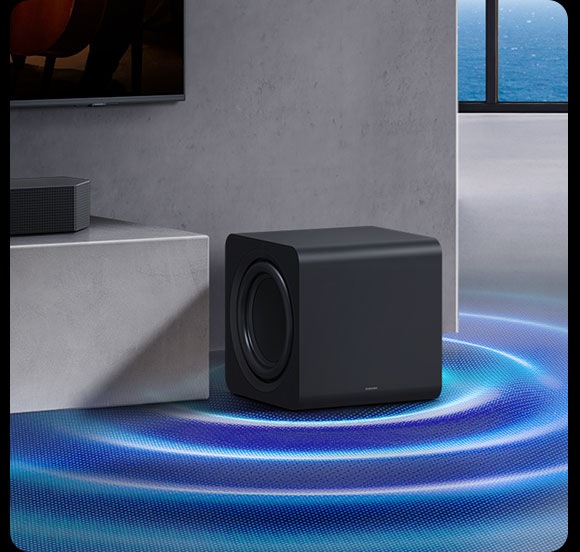 Sound waves emanate from a subwoofer in a living room setting.