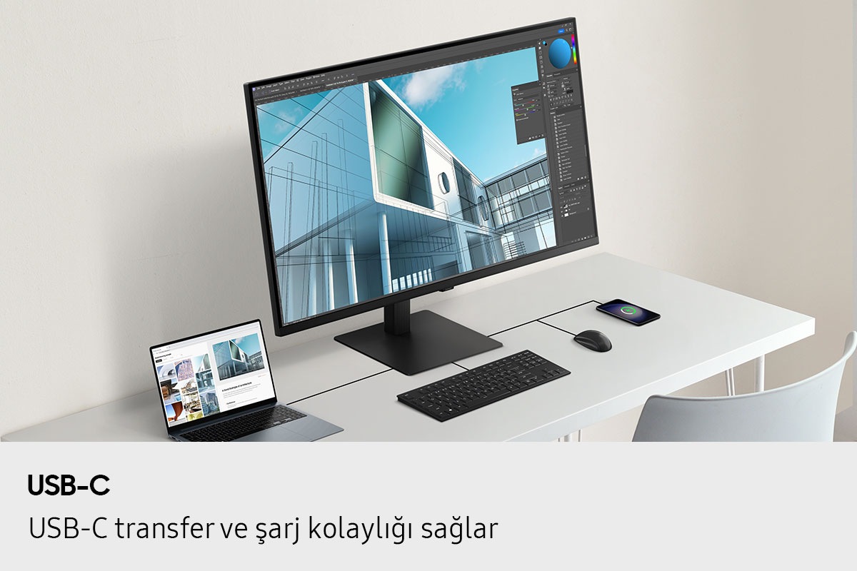 USB-C. USB-C dosya aktarımını ve şarj etmeyi kolaylaştırır. Bir masa üzerinde dizüstü bilgisayar, monitör, klavye, fare ve cep telefonu tek bir kabloyla birbirine bağlanmış.