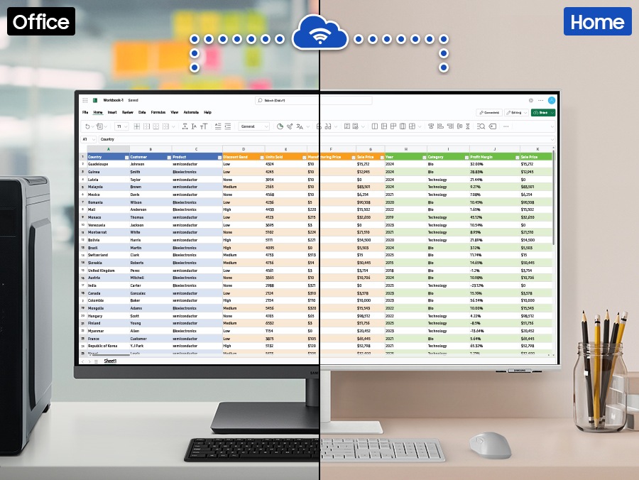 在辦公空間中的顯示器顯示一個包含大量資料的 Excel 檔案。這部顯示器透過 Wi-Fi 連接到家中的另一部顯示器，兩部顯示器都顯示相同的 Excel 檔案。