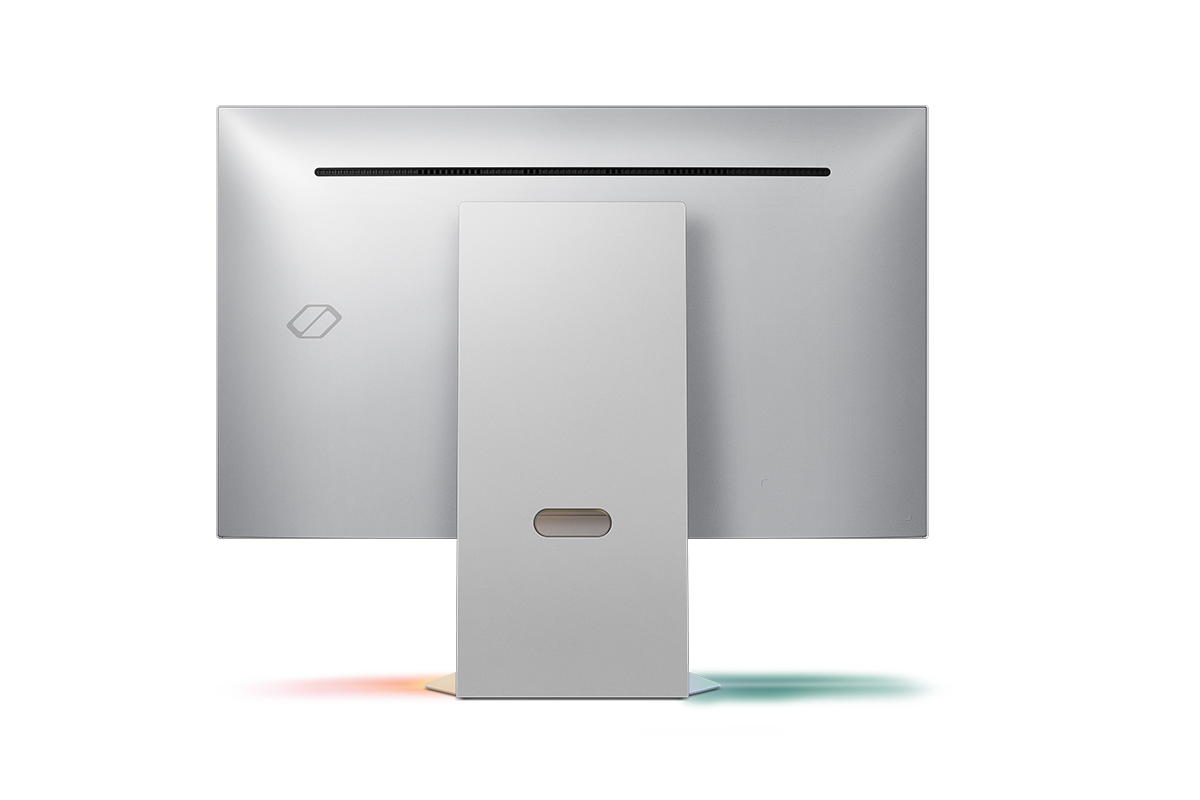 27吋 Odyssey 3D 平面電競顯示器 G90XF 的背面，綠色與紅色光芒倒映在地面上。