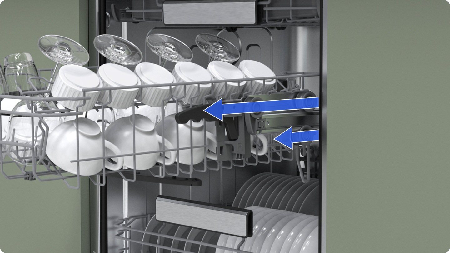 The middle rack with full of utensils is pulled out. The soft railing system allows the rack to slide in and out smoothly.
