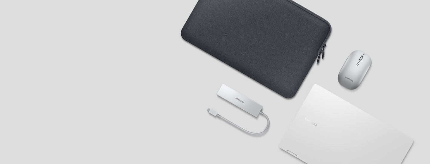 A silver-colored Galaxy Book3 360 is shown with its cover closed, displayed alongside a Multiport Adapter, Bluetooth Mouse Slim, and a gray neoprene pouch.