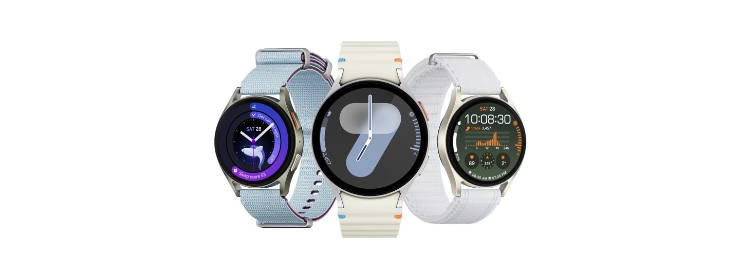 A Galaxy Watch7 is seen from the back with a Sport Band being attached. As the watch rotates to reveal its display, two other Galaxy Watch7 devices show up, one with Athleisure Band and the other one with Fabric Band. The three devices are arranged together displaying different watch faces.