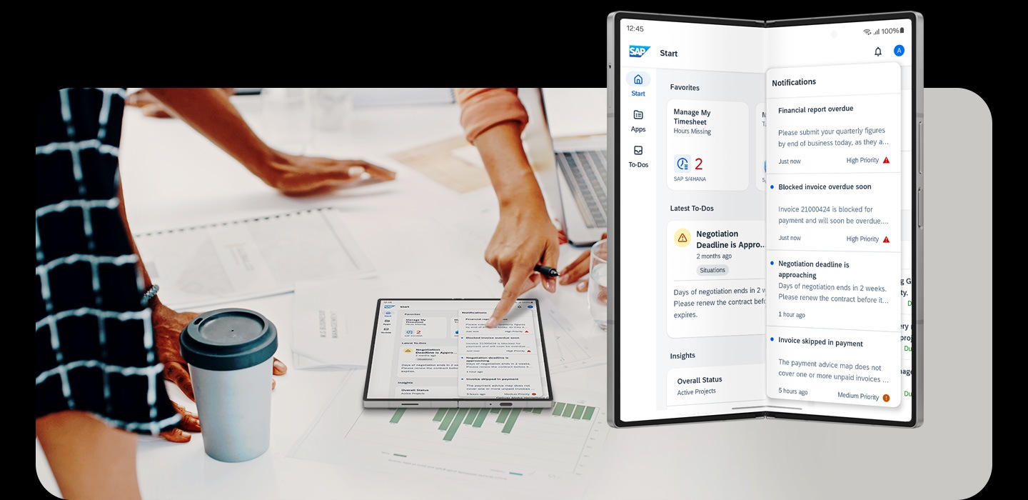 Galaxy Z Fold6 seen unfolded from the main screen during a business meeting with the SAP Mobile Start app in use.