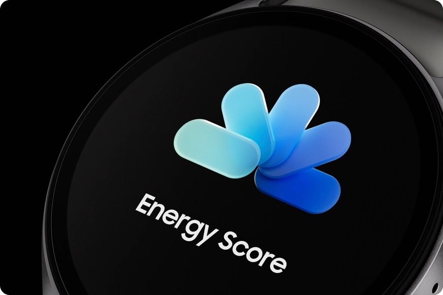 A Galaxy Watch7 seen from the back revealing its embedded processor with electric current flowing. The watch then rotates to show its screen displaying the time, a 'My Energy Score' screen and a 'Daily Activity' screen, one at a time.