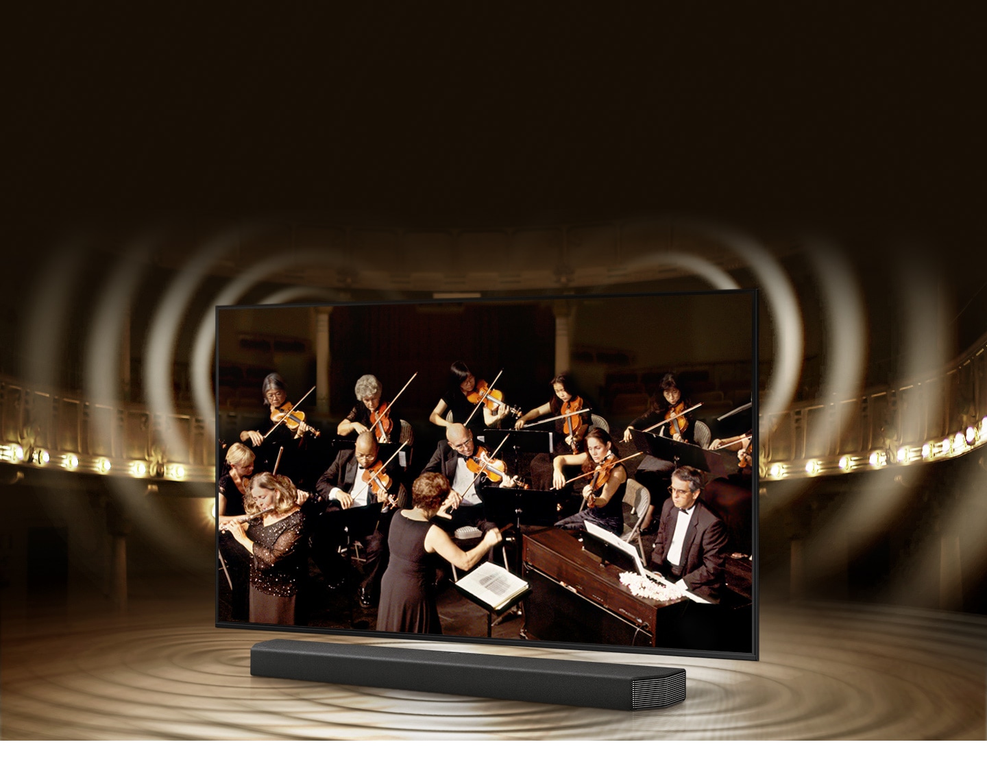 Simulated sound wave graphics from TV and soundbar demonstrate Q Symphony technology as they play sound together.
