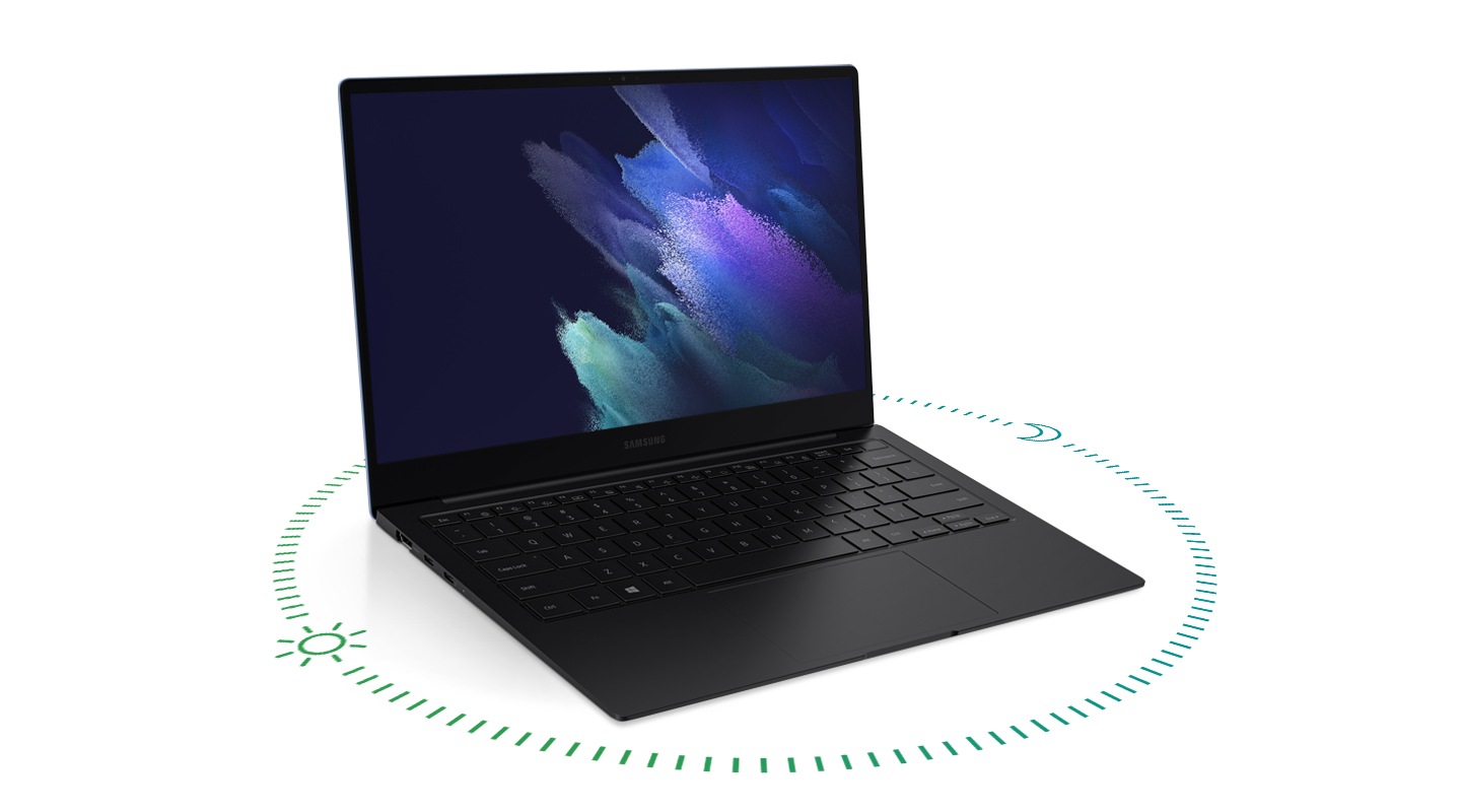 Galaxy Book Pro đang nằm trên mặt đất với một vòng tròn màu xanh lá cây xung quanh nó