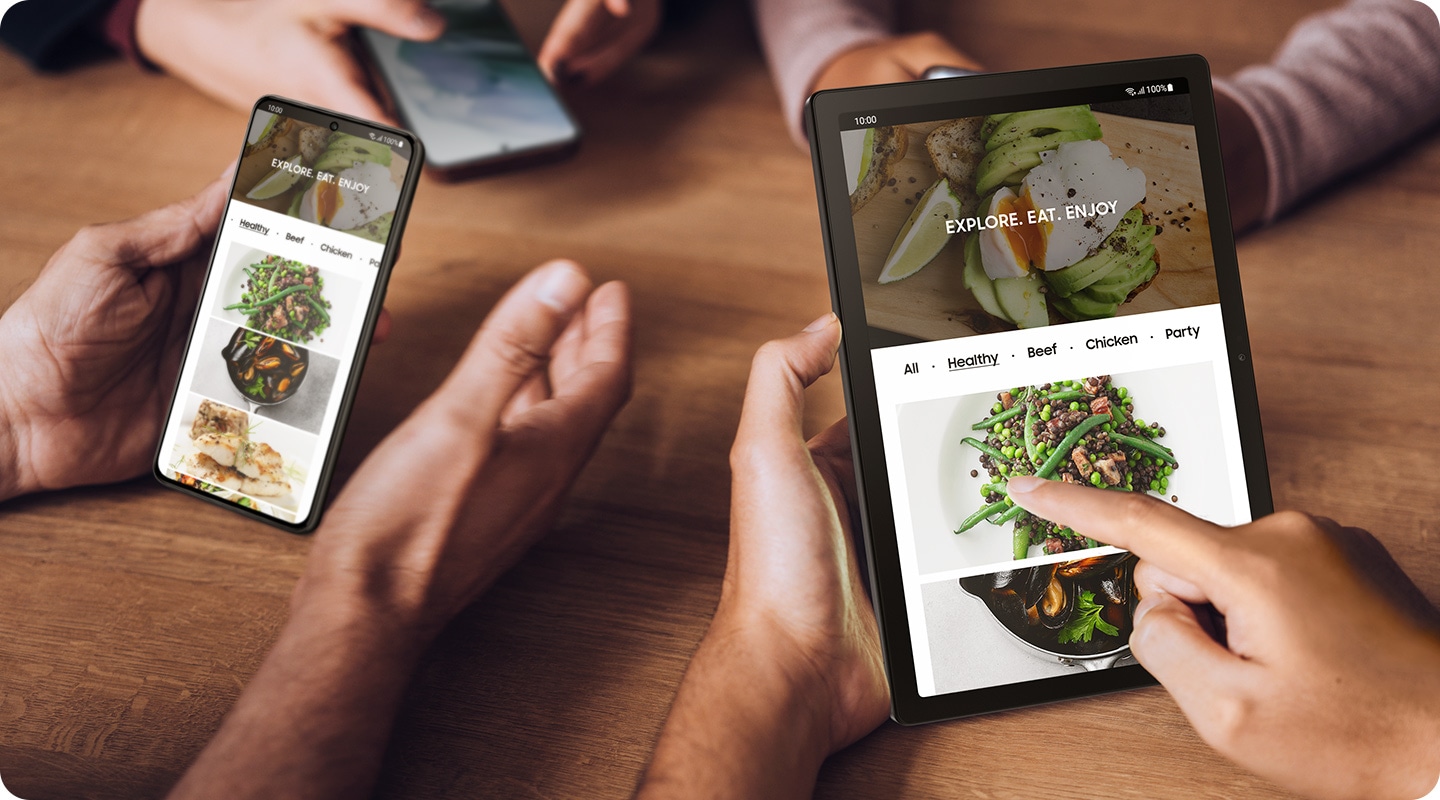 The same app featuring various food recipes is shown running on Galaxy Tab A8 and a Galaxy smartphone.
