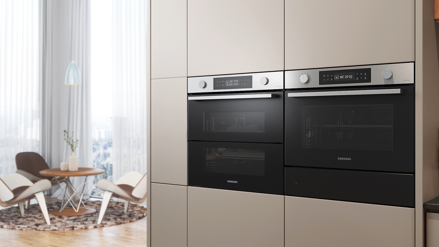 Shows the built-in oven installed in a kitchen, with two cooking zones and a hinged door, next to a Microwave Combi oven.