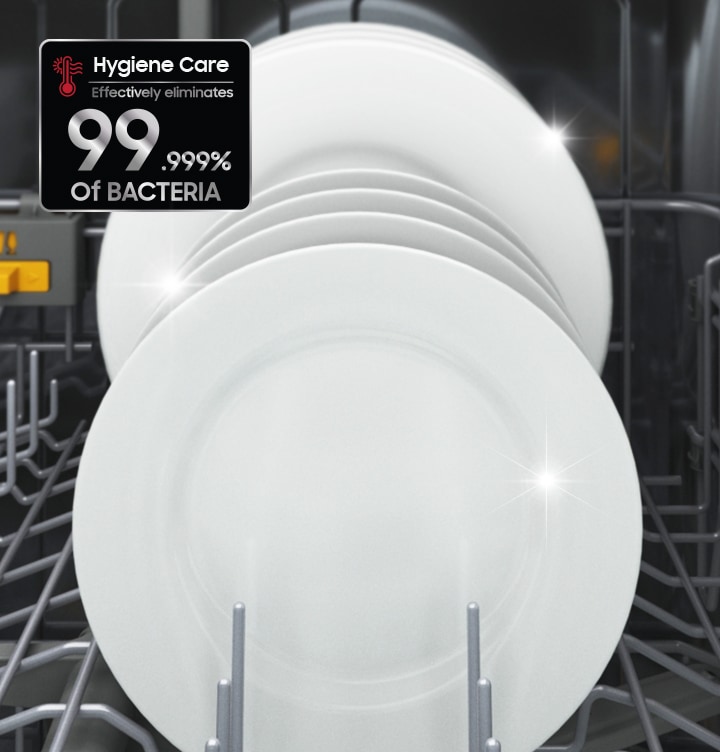 Shows a dishwasher full of plates that have been rinsed at 70˚C using the Hygiene Plus option to eliminate 99.999% of bacteria.