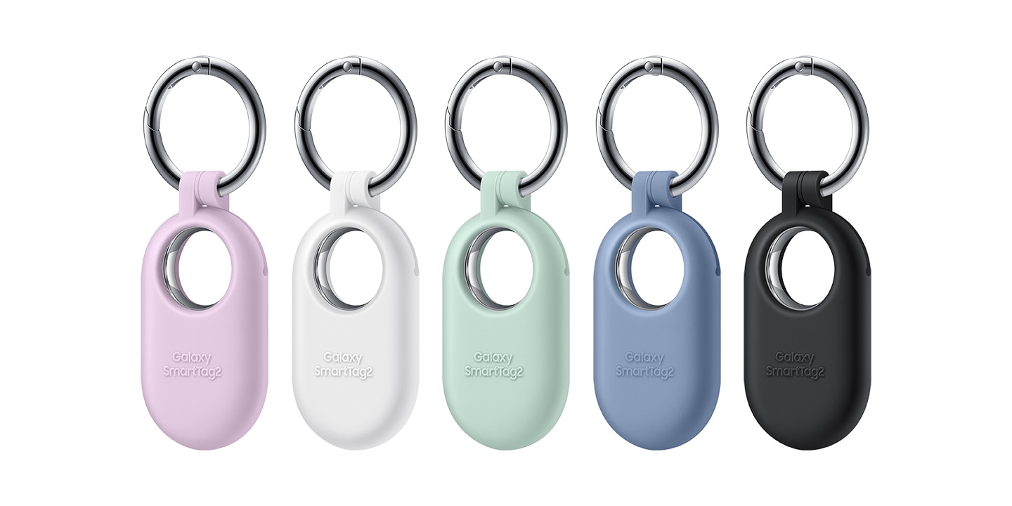 Five Galaxy SmartTag2 devices are shown, each with a different Silicone Case colorway in the following order from left to right: Lavender, White, Mint, Blue and Black.