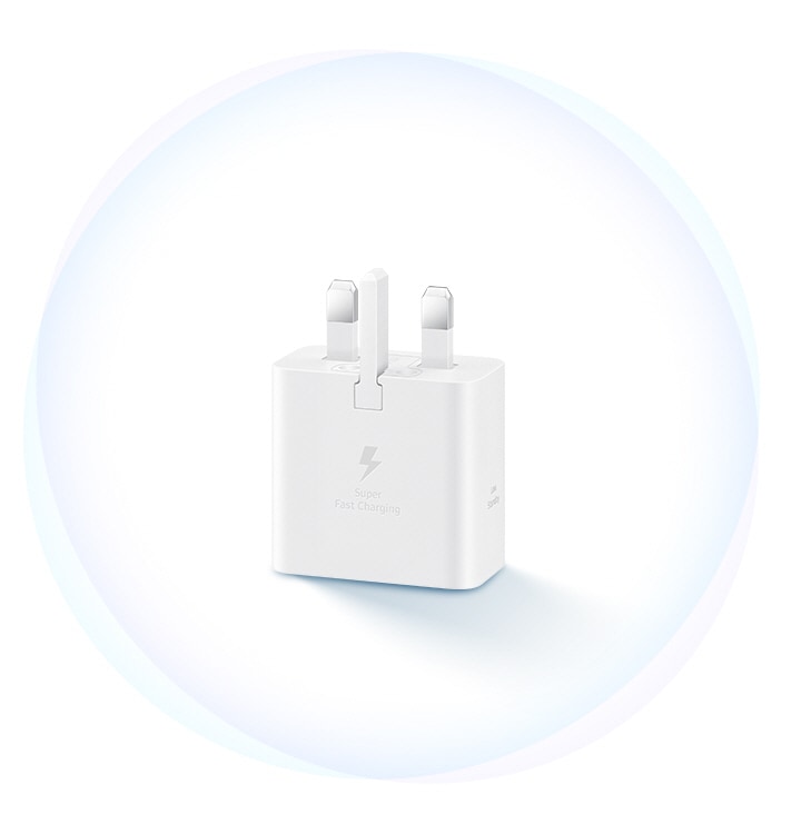 A white Power Adapter is placed plug-face-up. On the adapter, a thunderbolt icon is shown along with text below that reads 'Fast Charging'.