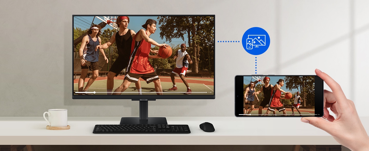 A smartphone wirelessly mirrors a basketball video to a monitor. A screen mirroring icon shows the connection between devices.