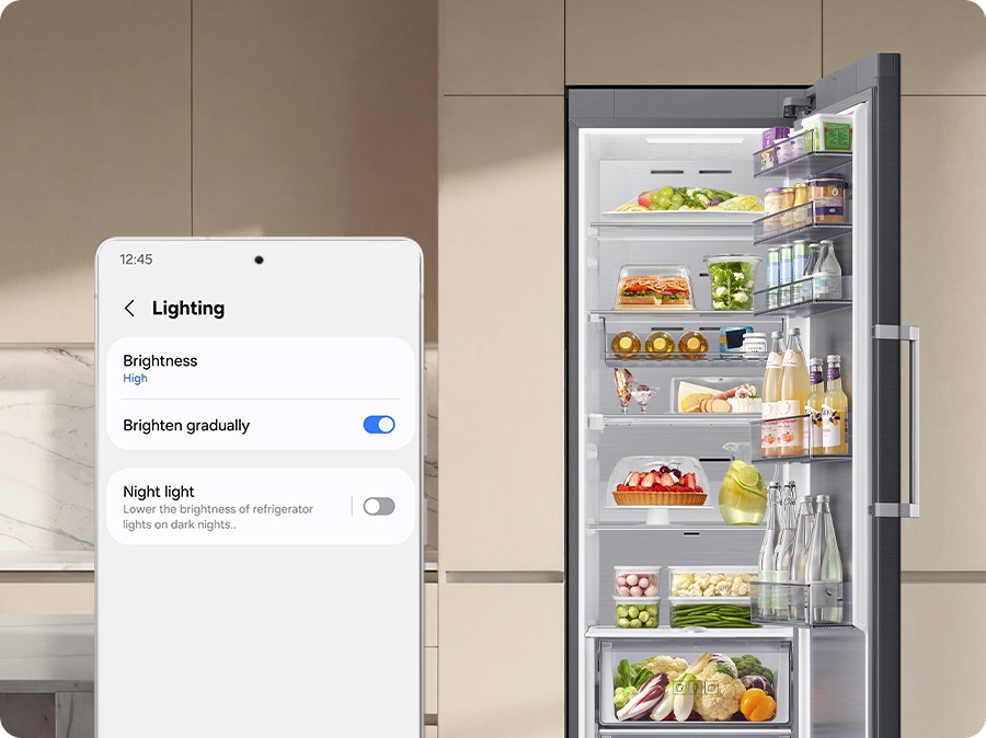 The refrigerator lamp shines brightly in a well-lit room with 'brighten gradually' set in the SmartThings app, and glows dimly in a dark room in 'Night Light' mode.