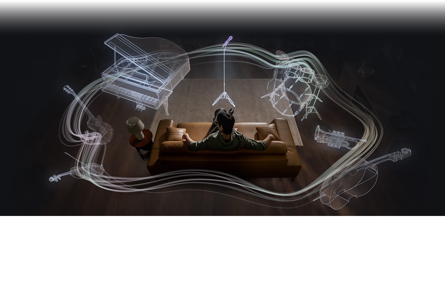 A man sitting on a couch as a collection of instruments appear in a circle around him. The instruments include a mic with a mic stand, a drum set, trumpet, cello, violin, electric guitar and grand piano. The instruments are shown in a outline, showing the 360 Audio system available on Galaxy Buds4.