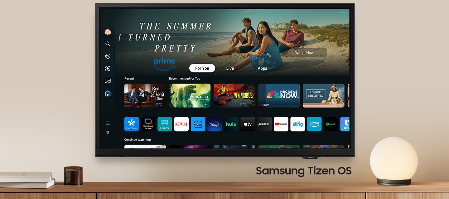 A wall-mounted TV shows popular apps and curated content on the home menu. "Samsung Tizen OS"