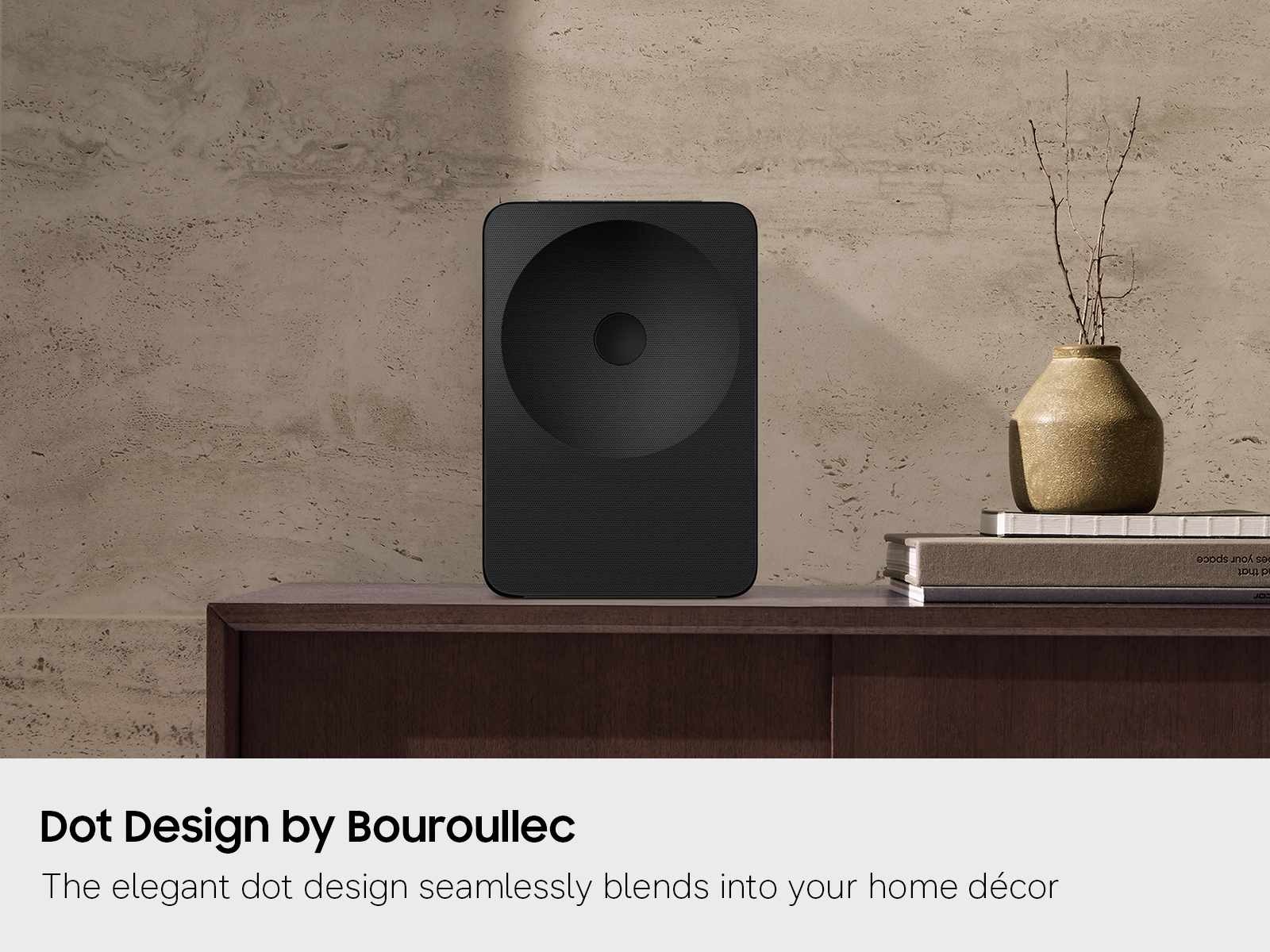 A lifestyle shot of a Music Studio LS70H speaker in a designer living room setting.