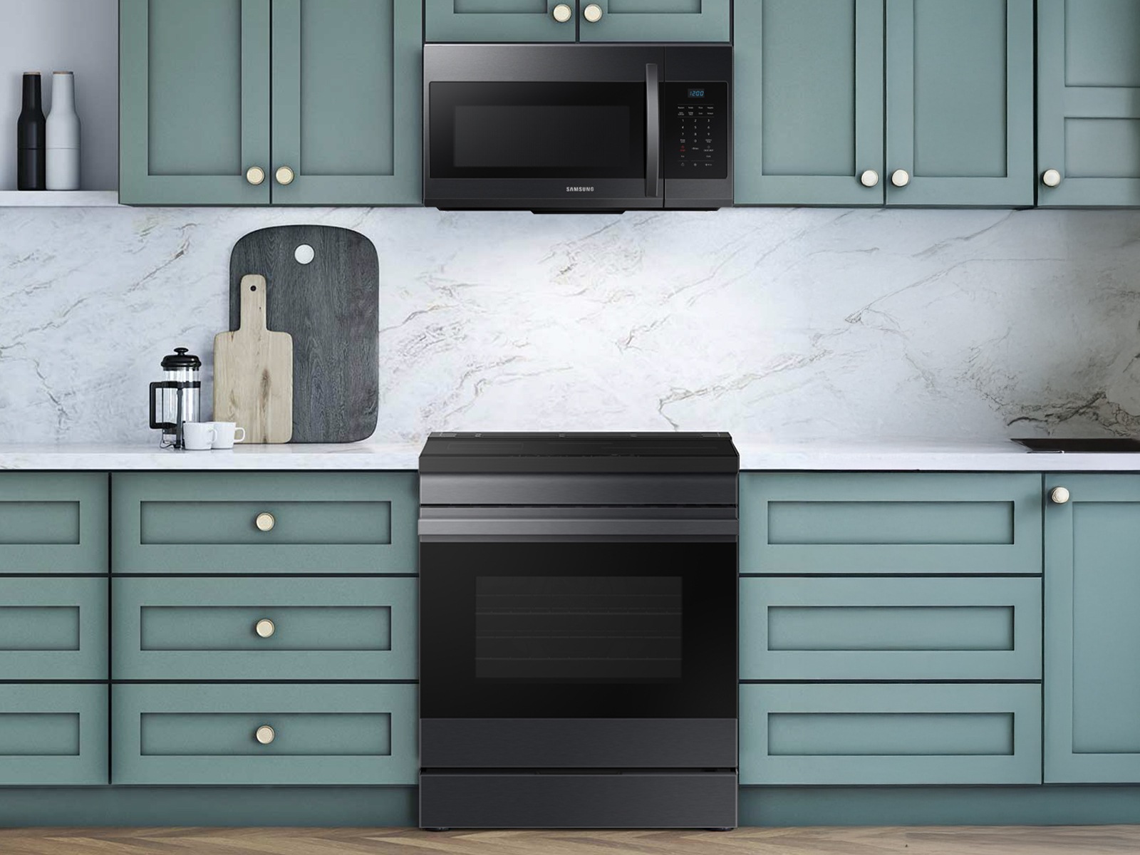 Over-the-range microwave in a modern kitchen with green cabinets