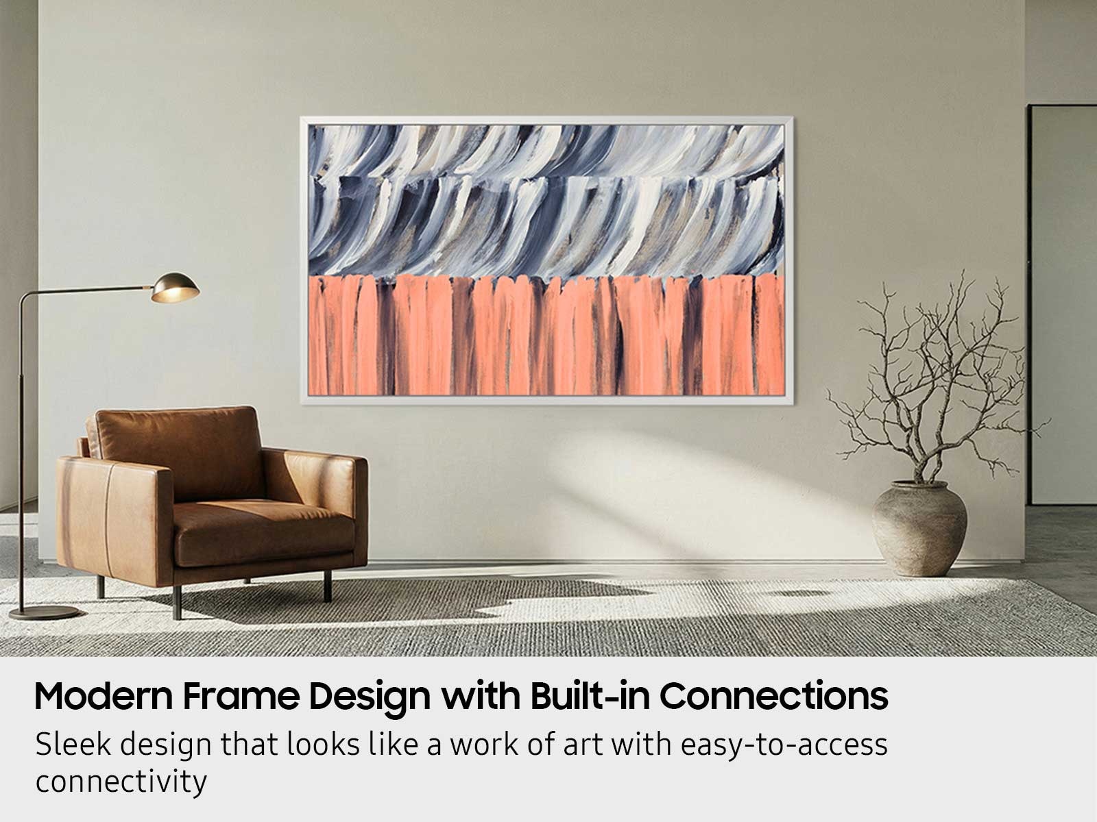 An artistic lifestyle shot showing The Frame LS03HE in a modern designer living room.