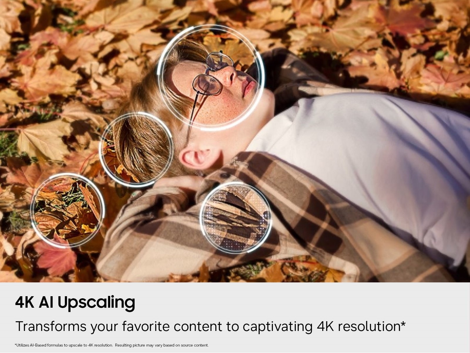 An image of a boy in glasses lying on fall leaves being used to represent the ability of the Samsung Mini LED M70H television to upscale standard-def content to 4K.