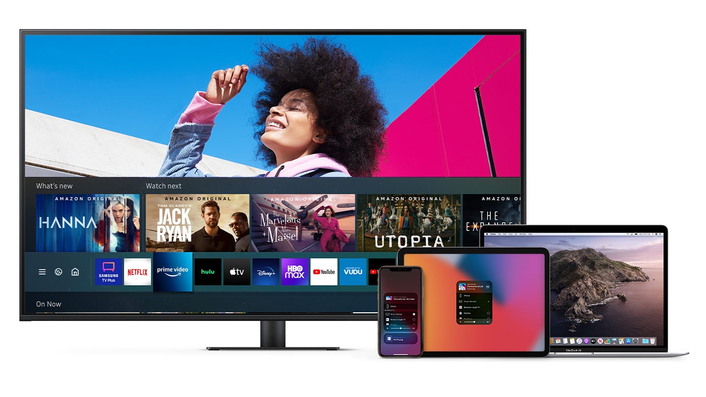 A monitor is connected with a mobile, tablet, and a laptop and a content from the mobile and tablet is played on the monitor.