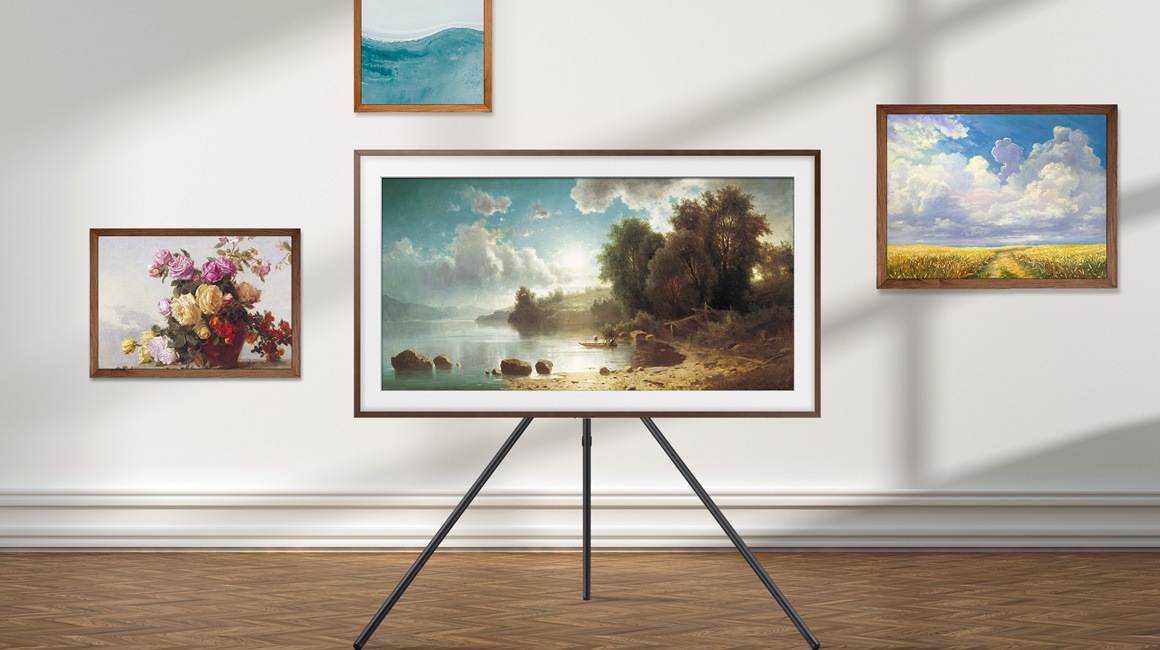 TV on Stand next to sofa.