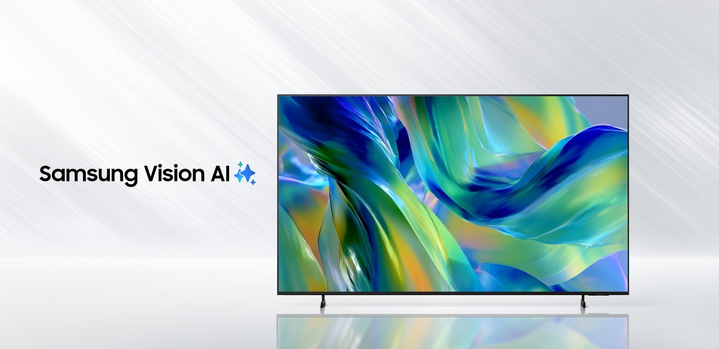 D&ograve;ng chữ Samsung Vision AI được đặt cạnh logo Samsung AI. Gần đ&oacute;, một chiếc TV bật l&ecirc;n để hiển thị c&aacute;c h&igrave;nh ảnh trừu tượng.