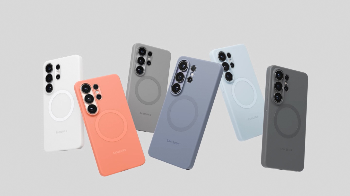 Close up of the magnet ring of Silicone Magnet Case in Light Blue is seen. The full case is seen from the back. As it rotates, the color transforms to Gray and then Blue Violet. Next, the case is seen being installed onto Galaxy S26 Ultra in Cobalt Violet. The device rotates and five more devices with Silicone Magnet Cases in Coral Red, Gray, Light Blue, Black and White installed are seen in a row along with the original device. The devices all disappear into the original device. It rotates and then all six devices reappear and spin in a circle. As the devices rotate, a close up of the camera lenses are seen. Next, they are arranged in a fan before flying upwards and disappearing. All six devices are seen again in a row from the back. The Blue Violet case comes away from the top of one device and then attaches back onto it. 