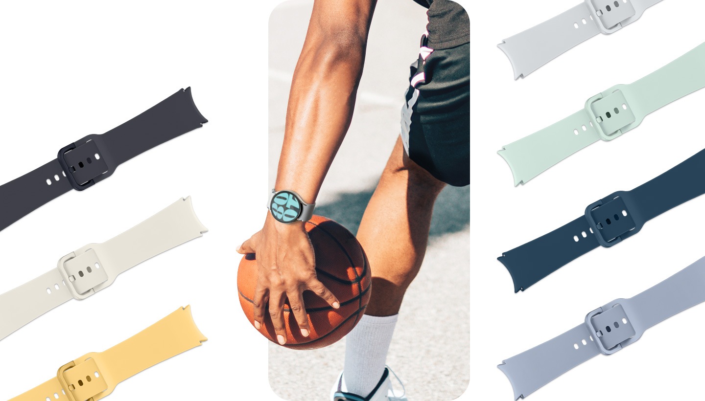 A man in a sporty outfit is holding a basketball in one hand while wearing a Galaxy Watch6 device attached with a Sport Band around his wrist. Other Sport Bands in different colors are laid straight on the right and left side.