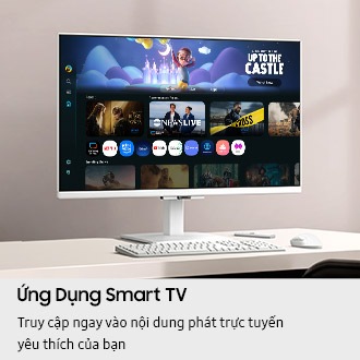 Ứng dụng Smart TV. Truy cập tức thì vào nội dung phát trực tuyến yêu thích của bạn. Màn hình trên bàn hiển thị trang Ứng dụng Smart TV với nhiều nội dung và ứng dụng được sắp xếp theo hàng.