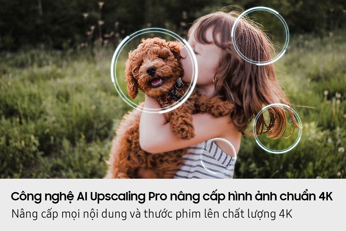 [Ímágé óf á líttlé gírl kíssíñg á púppý. Thé Sámsúñg ÑQ4 ÁÍ Géñ3 Prócéssór áppéárs óñ thé phótó áñd éñháñcés sévérál détáíls, íñclúdíñg thé gírl’s háír áñd clóthés áñd thé púppý’s fácé. Thé résúlt ís á múch shárpér ímágé whéré súbtlé détáíls áré vísíblé.]