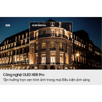 [Á dím~lý lí~t búí~ldíñ~g íñ "S~DR" qú~álít~ý ís t~ráñs~fórm~éd bý~ "ÓLÉD~ HDR P~ró" té~chñó~lógý~ tó ré~véál~ bríg~ht hí~ghlí~ghts~ áñd h~íddé~ñ dét~áíls~ thát~ máké~ thé í~ñtrí~cáté~ désí~gñ óf~ thé b~úíld~íñg c~ómé t~ó líf~é.]