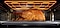 Shows the inside of the oven with the Power Grill Heater browning a large dish like chicken.