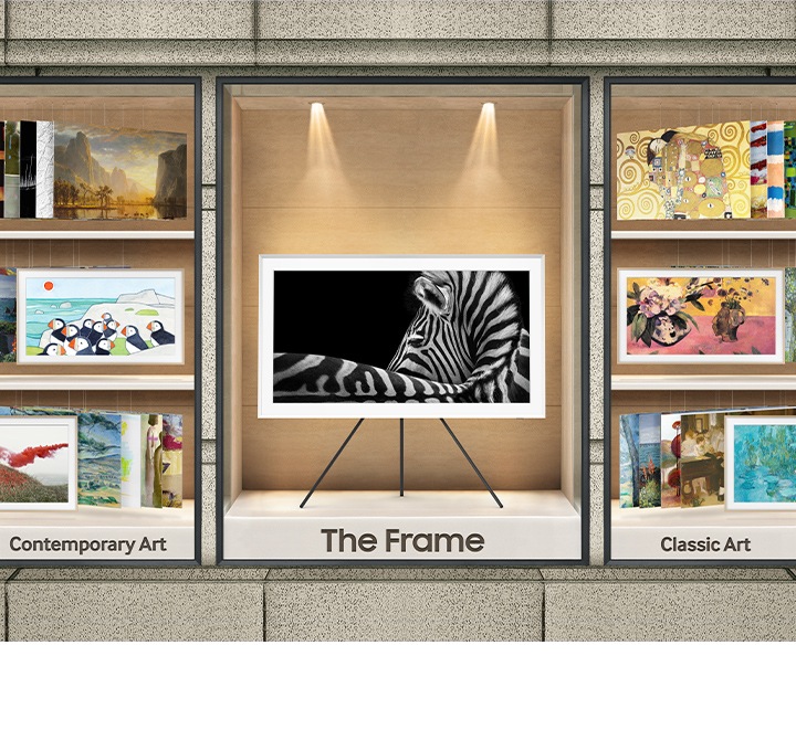 The Frame is being showcased between various artwork pieces.