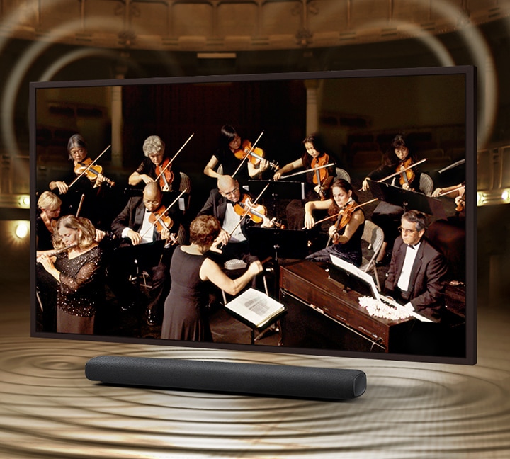 Simulated sound wave graphics from TV and soundbar demonstrate Q Symphony technology as they play sound together.