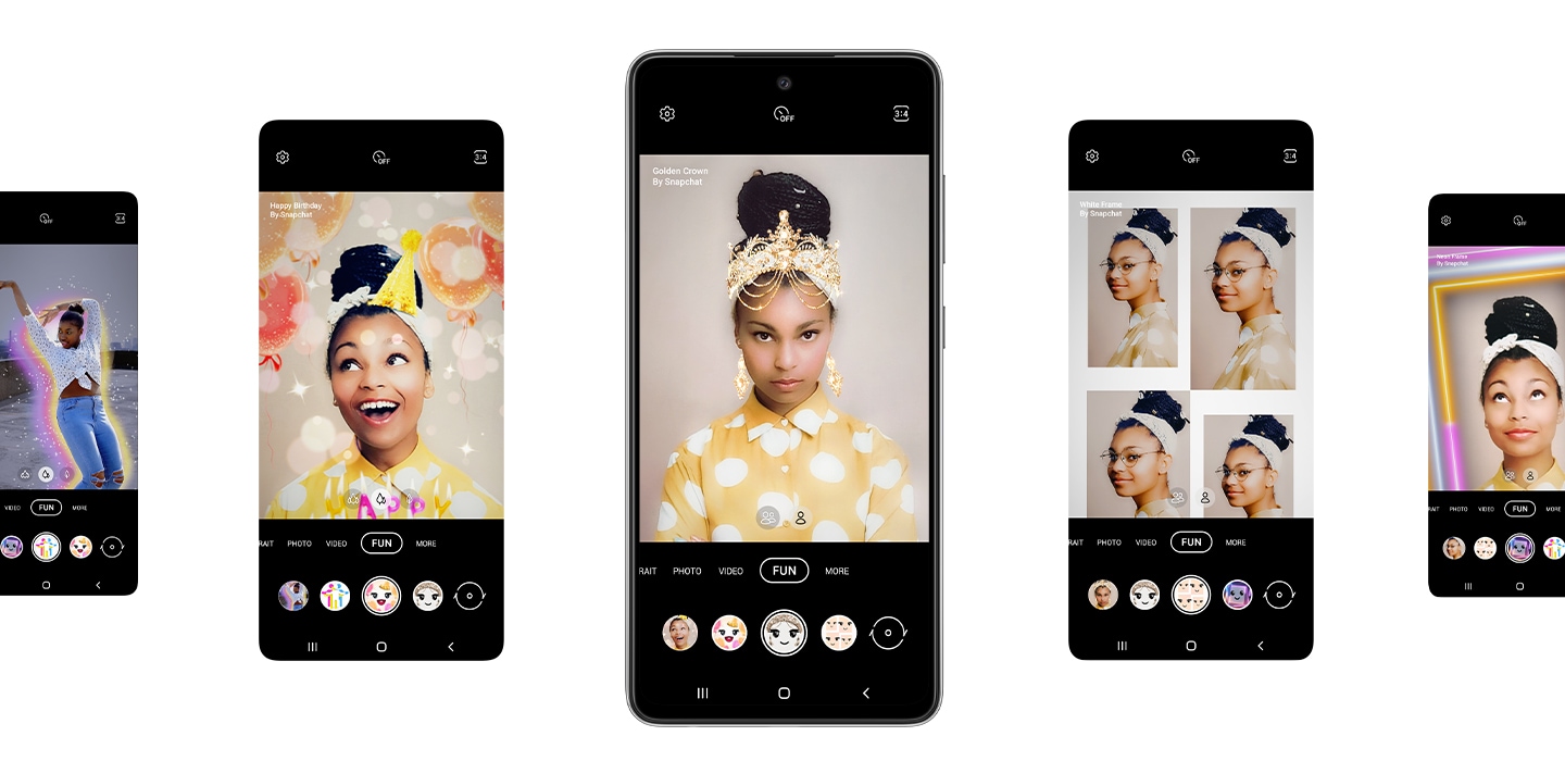1. Galaxy A52s 5G seen from the front. On either side of the phone are four total representations of the screen. On each screen, the Fun mode option selected in the Camera app onscreen, and shows the five different lenses available. From left is Neon Body, Happy Birthday, Golden Crown, White Frame and Neon Frame. In the phone in the center we see a woman taking a selfie and using the Snapchat lens Golden Crown, which puts an ornate gold crown on the top of her head.