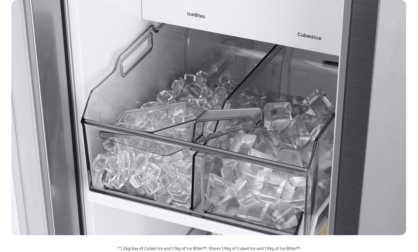 The dual tray in the freezer is full of ice. The left tray is full of large ice cubes and the right tray is full of small ice cubes.