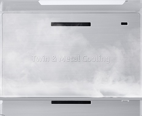 The Metal Cooling plates inside the refrigerator look extremely cold and the cold air flows around.