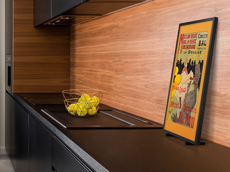 The Frame is mounted on a Vertical stand on a table.