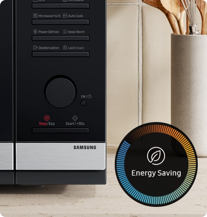 Shows the control panel of microwave. The icon for energy saving is displayed on the side.