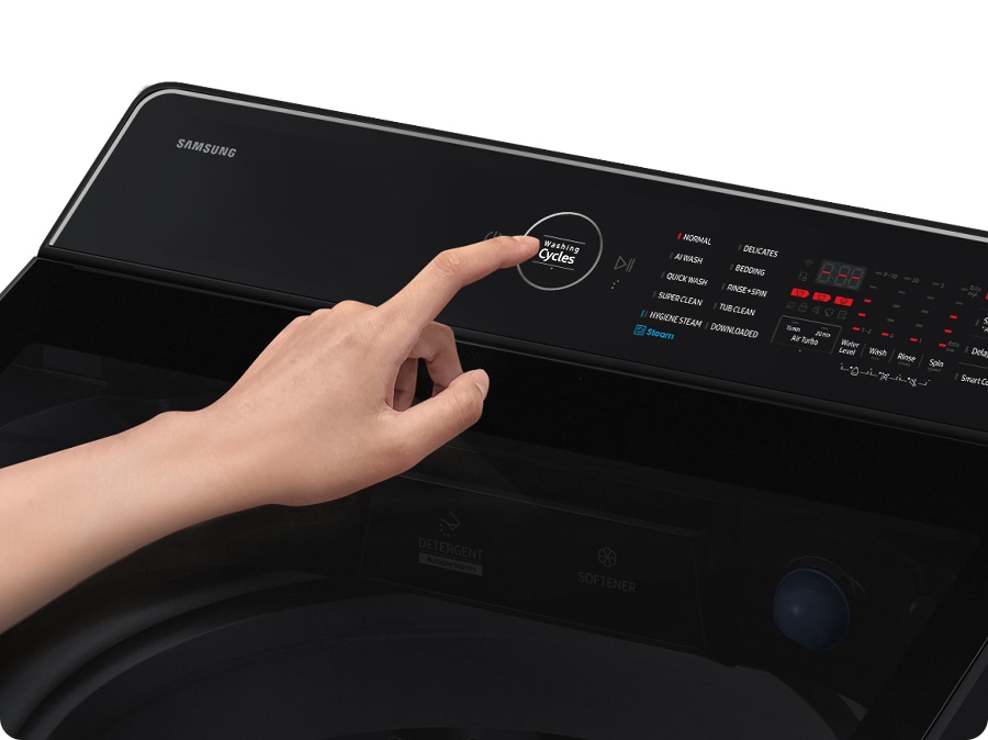 A person is controlling the rear control panel.