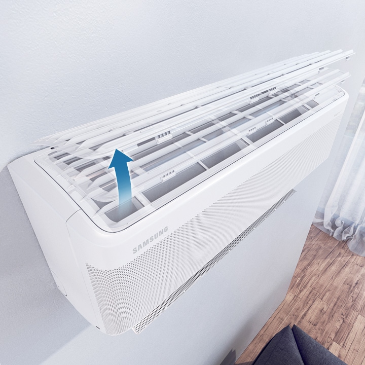 Shows that the Easy Filter Plus can be easily removed by lifting up the cover of the air conditioner, so that it can be cleaned.