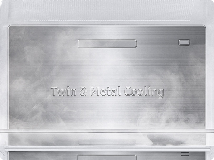 The Metal Cooling plates inside the refrigerator look extremely cold and the cold air flows around.