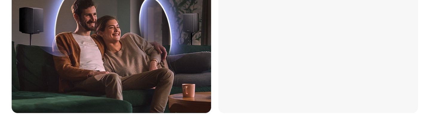 People dance in a room filled with sound waves, coming from a soundbar and rear speakers set on opposite ends of the room.