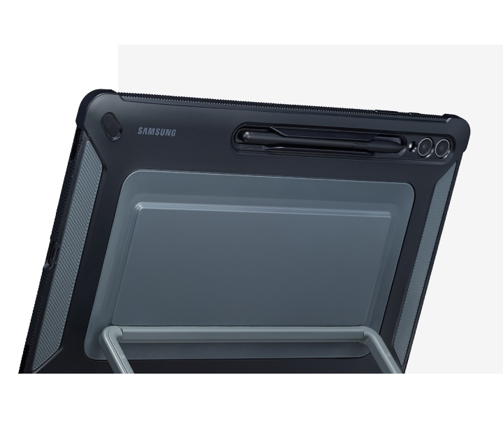 A back view of Galaxy Tab S9 Ultra covered with an Outdoor Cover, propped up using the kickstand and showcasing the S Pen holder.