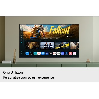 One UI Tizen’s home screen, with the various apps and services available, is displayed on a TV in a living room.