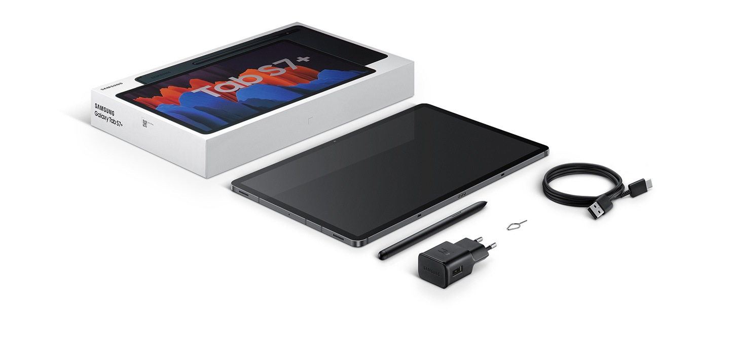 Flat lay of items included in box with Galaxy Tab S7+. The packaging, the device, S Pen, travel adapter, data link cable, and SIM ejection pin