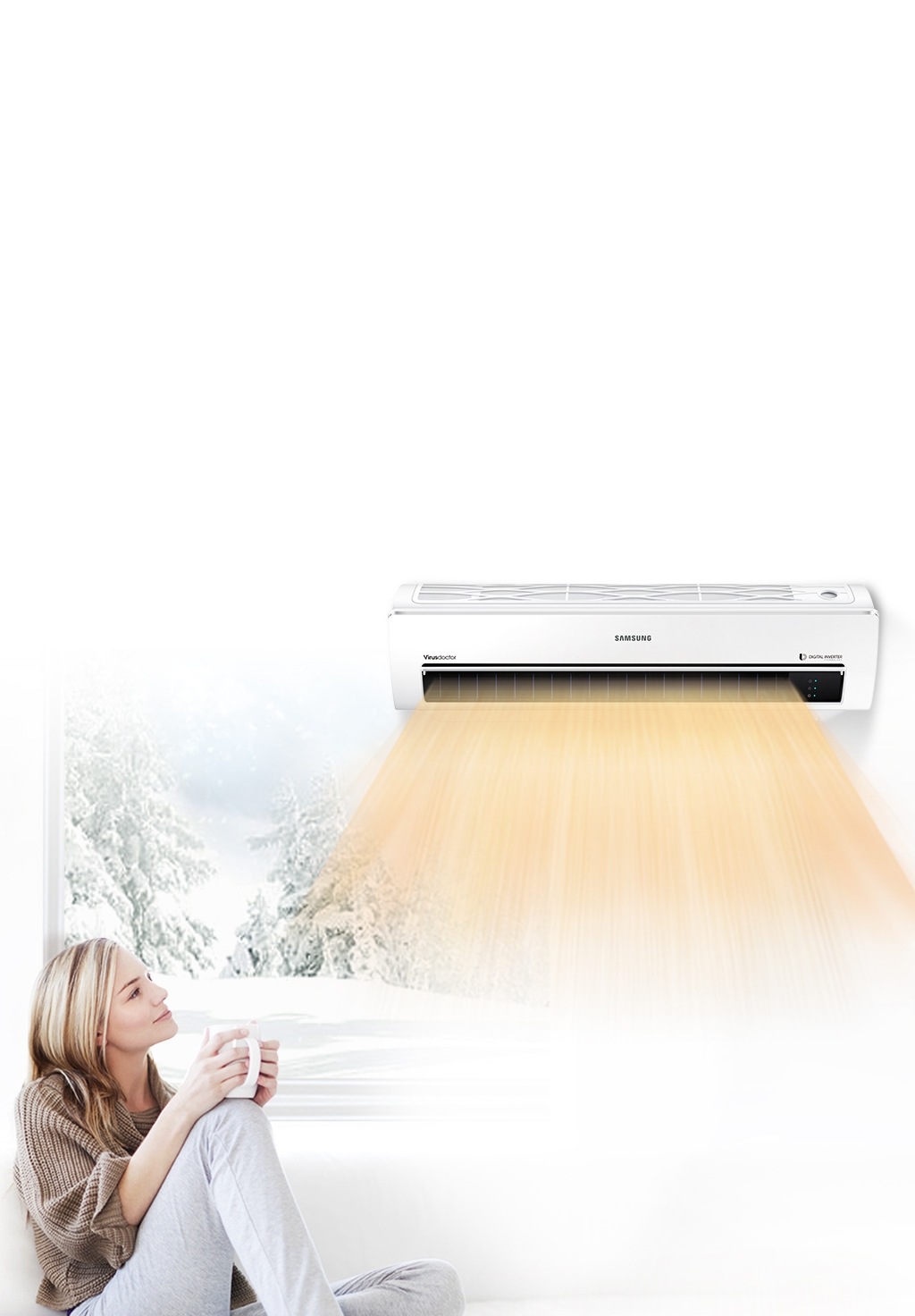 실내에서 여자가 커피를 마시며 눈이 오는 창밖을 바라보고 있습니다. 벽에 걸려있는 에어컨에서는 난방기능을 이용하여 따뜻한 바람이 나오고 있습니다.